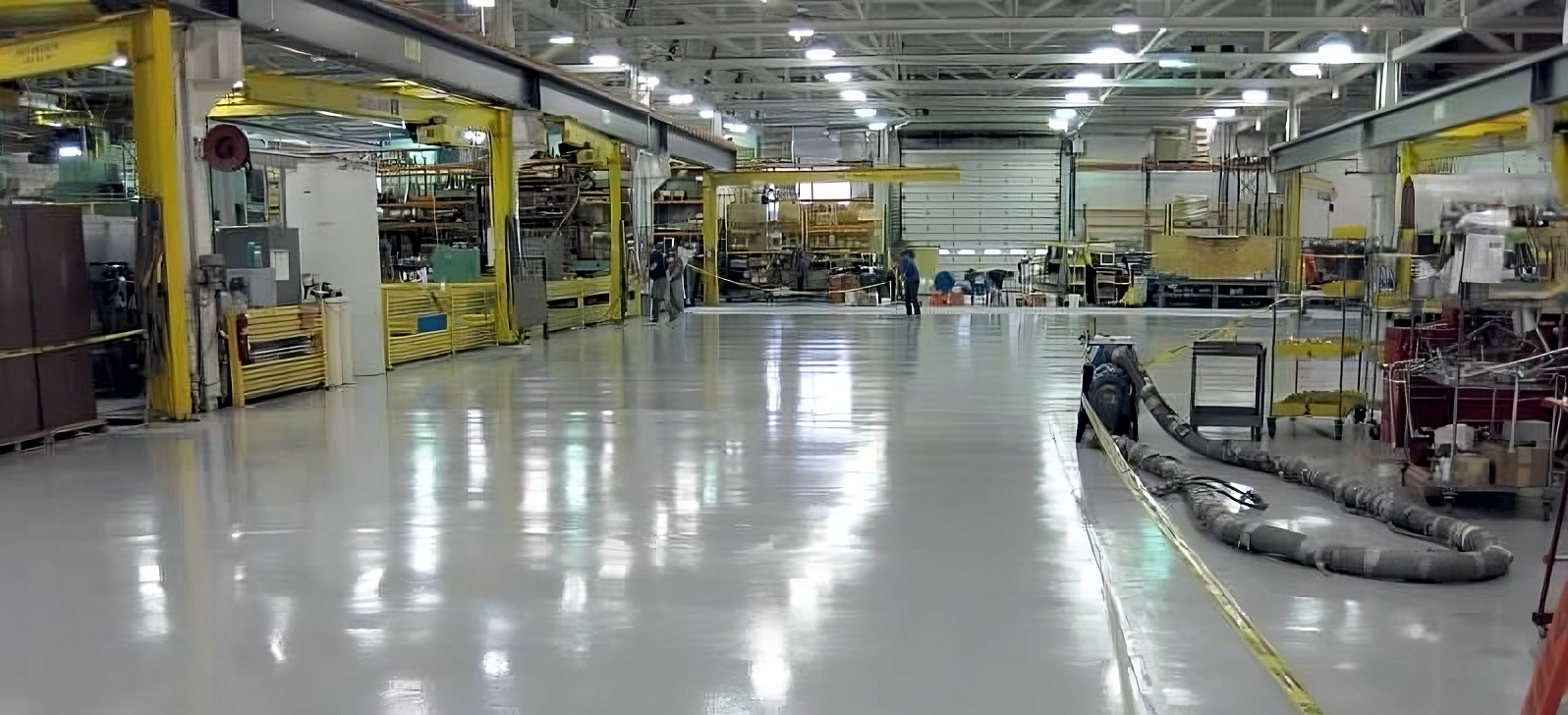 Factory floor coated with industrial-grade coatings by Memphis Coatings Company, enhancing durability, safety, and performance.