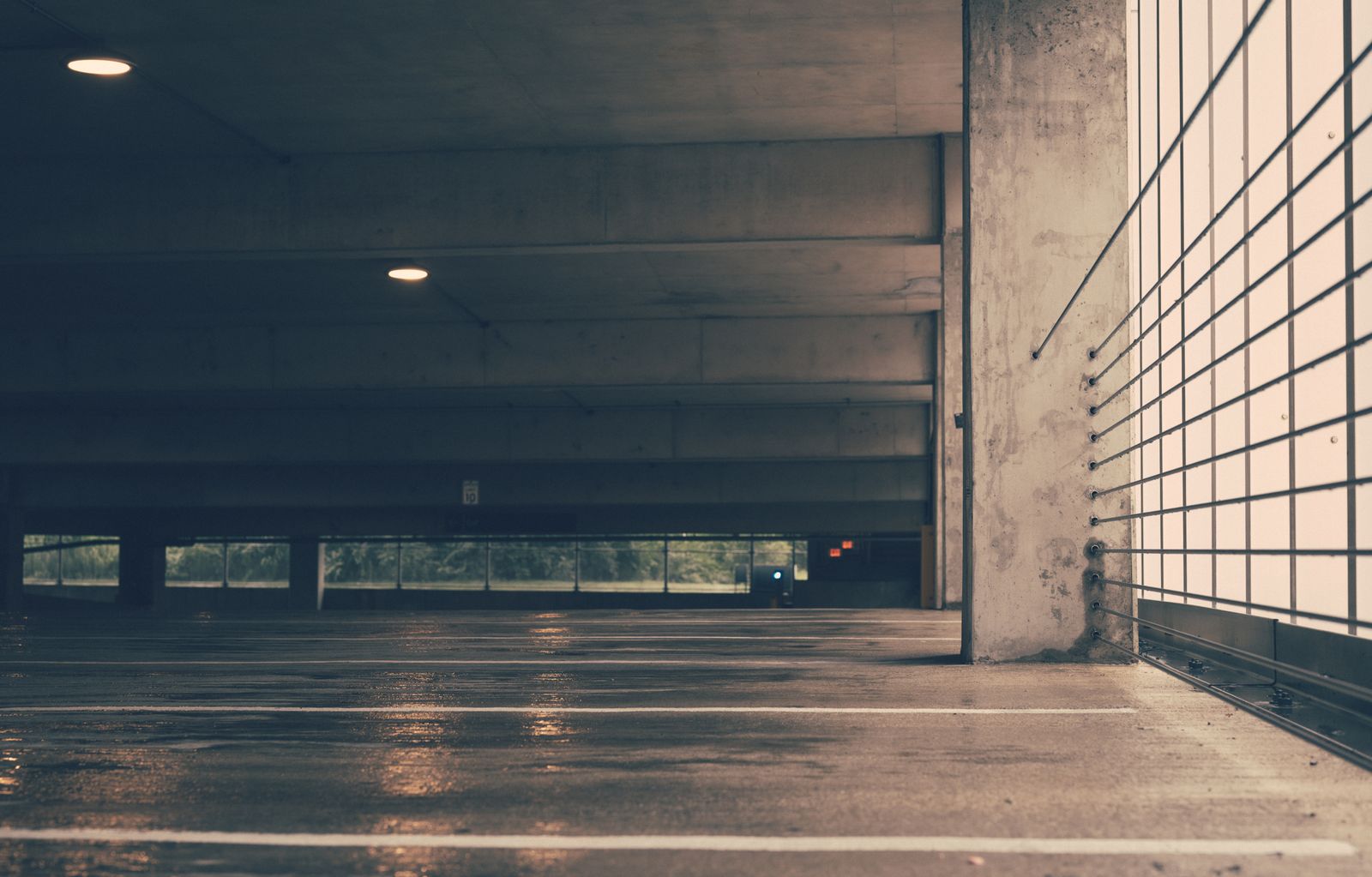 Are epoxy garage floors slippery: standing water on a smooth concrete parking floor