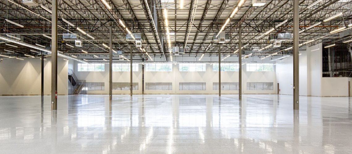 Wide view of a freshly coated concrete floor with a high gloss finish